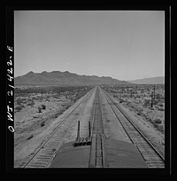 [Untitled photo, possibly related to: Needles (vicinity), California. Desert country along the Atchison, Topeka, and Santa Fe Railroad between Needles and Barstow, California]. Sourced from the Library of Congress.