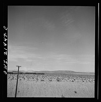 [Untitled photo, possibly related to: Klondike (vicinity), California. Going around a curve on the Atchison, Topeka and Santa Fe Railroad between Needles and Barstow, California]. Sourced from the Library of Congress.