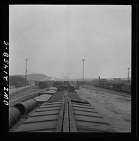 [Untitled photo, possibly related to: Barstow, California. A general view of the Atchison, Topeka and Santa Fe Railroad yard]. Sourced from the Library of Congress.