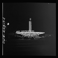 Hollywood, California. A neon sign by Russell Lee