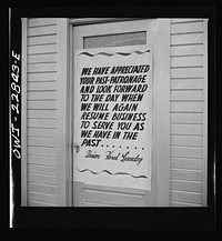 Los Angeles, California. Sign on a closed laundry by Russell Lee