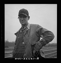 Cicero, Illinois. A switchman at the Clyde yard of the Chicago, Burlington and Quincy Railroad. Sourced from the Library of Congress.