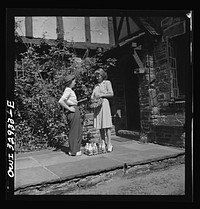 [Untitled photo, possibly related to: Bryn Mawr, Pennsylvania. Mrs. Helen Joyce, one of the many women now working for the Supplee-Wills-Jones Milk Company. She is making her rounds collecting bills]. Sourced from the Library of Congress.
