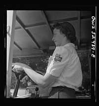 Bryn Mawr, Pennsylvania. Mrs. Helen Joyce, one of the many women now working for the Supplee-Wills-Jones Milk Company. She has one child and her husband is a seaman first class in the U.S. Navy. Sourced from the Library of Congress.