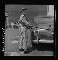 [Untitled photo, possibly related to: Philadelphia, Pennsylvania. Miss Frances Heisler, a garage attendant at one of the Atlantic Refining Company garages. She was formerly a clerk in the payroll department of the Curtis Publishing Company]. Sourced from the Library of Congress.