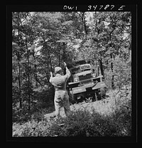 Warner Robins, Georgia. Air Service Command, Robins Field. Part of the training of the truck drivers of the depot group consists of driving many times through an obstacle course in the woods. Sourced from the Library of Congress.