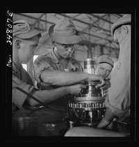 Warner Robins, Georgia. Air Service Command, Robins Field. Assembling the nose section of a Pratt and Whitney engine. Sourced from the Library of Congress.