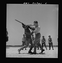 [Untitled photo, possibly related to: Daniel Field, Georgia. Air Service Command. Bayonet class: learning how to disarm an opponent]. Sourced from the Library of Congress.