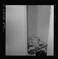 Clovis, New Mexico. Compartment in a new Atchison, Topeka and Santa Fe Railroad caboose containing oil and grease for journal boxes. Sourced from the Library of Congress.