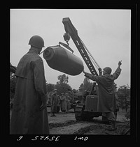 Greenville, South Carolina. Air Service Command. Men of the ordinance, supply and maintenance company of the 25th service group taking 2000 pound bombs out of the revetment area. Sourced from the Library of Congress.