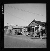 Main street, showing barber shop in  section. Homestead, Florida. Sourced from the Library of Congress.
