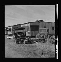 A few crowded, dirty, expensive camps, with bad sanitary conditions, no light, insufficient and poor water supply, exist near Belle Glade, Florida, for transient migrant labor. One toilet for 150 people. Sourced from the Library of Congress.