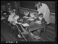 First grade children and teacher. Goodman School, Coffee County, Alabama. Sourced from the Library of Congress.