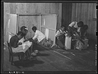 [Untitled photo, possibly related to: Thelma Powell, Jeneaver Cody and Elnora Tyler with house and furniture and curtains they are making in first grade. Flint River Farms, Georgia]. Sourced from the Library of Congress.