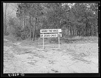 The poorer the land, the more frequently one sees religious signs along highways. Alabama. Sourced from the Library of Congress.