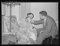 [Untitled photo, possibly related to: Doctor examining child in home. Greenbelt, Maryland]. Sourced from the Library of Congress.