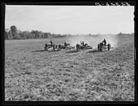 Tractors preparing land for planting oats in the fall after the cotton has been picked and the stalks plowed up. Good Hope Plantation, Mileston, Mississippi. Sourced from the Library of Congress.