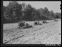 Tractors preparing land for planting oats in the fall after the cotton has been picked and the stalks plowed. Good Hope Plantation, Mileston, Mississippi. Sourced from the Library of Congress.