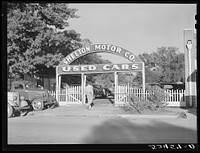 [Untitled photo, possibly related to: Many es spend their cotton picking money on used cars. Belzoni, Mississippi]. Sourced from the Library of Congress.