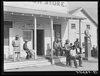 es cut each others' hair in front of plantation store after being paid off on Saturday. Mileston Plantation, Mississippi Delta. Sourced from the Library of Congress.