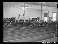 Interior of courtroom during trial of automobile accident case during court week in Granville County Courthouse, Oxford, North Carolina. This was the second day of Superior Court. See subregional notes (Odum). November 22, 1939. Sourced from the Library of Congress.