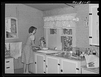 Daughter of FSA (Farm Security Administration) rehabilitation borrower who rents farmland from Indians. Yakima County, Washington. Sink was installed by tenant by Russell Lee