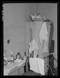 Bedroom in this house rented from Indian by FSA (Farm Security Administration) rehabilitation borrower is crowded and lacking in closet space. Yakima County, Washington by Russell Lee
