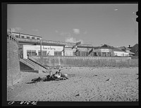 [Untitled photo, possibly related to: Sunbath on the beach. Seaside, Oregon] by Russell Lee
