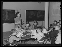 School in basement of church. Hermiston, Oregon. The school board didn't have adequate buses for transportation of all the children of workmen at Umatilla ordnance depot and consequently many did not attend school by Russell Lee