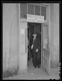 Entrance to the outgrown post office at Hermiston, Oregon by Russell Lee