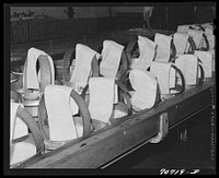 [Untitled photo, possibly related to: Cheesecloth on molds, in which the cheese will be pressed. Tillamook cheese plant, Tillamook County, Oregon] by Russell Lee