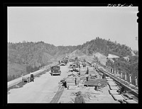 Construction work on Pit River Bridge, Shasta County, California. This bridge will be necessary after the Shasta Dam is completed. The backed up water will cover the lower lands by Russell Lee