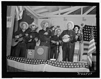 Tulare County, California. FSA (Farm Security Administration) farm workers' camp. Hired orchestra which played at the President's birthday ball by Russell Lee