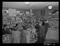 Woodville, California. FSA (Farm Security Administration) farm workers' community. Interior of the cooperative store by Russell Lee