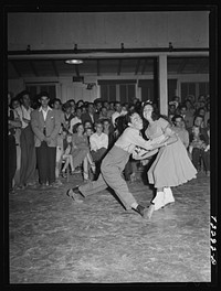 Jitterbug contest ended the festivities at the second annual field day  at the FSA (Farm Security Administration) farm workers' community. Yuma, Arizona by Russell Lee