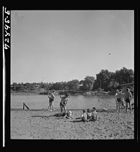 [Untitled photo, possibly related to: Redding, California. Youngster at the beach] by Russell Lee