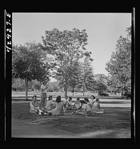 Redding, California. Girls picnicking at municipal park and beach on Sacramento River by Russell Lee