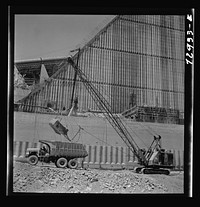 Shasta Dam, Shasta County, California. Loading truck with excavated dirt by Russell Lee