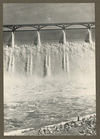 Grand Coulee Dam, Columbia Basin Reclamation Project, Wash. A portion of the spillway. A man standing in the lower right hand corner gives an idea of the size. Sourced from the Library of Congress.