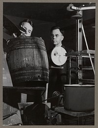Professor R.M. Hixon, right, who is doing research on the properties of starch made from "Iowa waxy maize," a hybrid corn developed at Iowa State College. Ames, Iowa. Sourced from the Library of Congress.