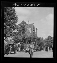 [Untitled photo, possibly related to: Banners and flags in the parade of the fiesta of the Holy Ghost. Santa Clara, California] by Russell Lee