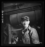 Chicago, Illinois. A worker in the Chicago and Northwestern Railroad locomotive repair shops. Sourced from the Library of Congress.