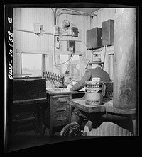 Chicago, Illinois. In a yardmaster's office at an Illinois Central Railroad yard. Sourced from the Library of Congress.