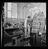 [Untitled photo, possibly related to: Chicago, Illinois. These pneumatic tubes in the Illinois Central Railroad yardmaster's office connect him with the general office]. Sourced from the Library of Congress.