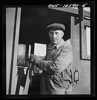 Chicago, Illinois. Turntable operator at the roundhouse at an Illinois Central Railroad yard. Sourced from the Library of Congress.