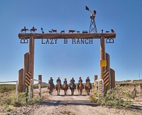 Wranglers of the historic Lazy B Ranch on the New Mexico border &mdash; in fact, entered from New Mexico &mdash; in eastern Arizona, return from a roundup..