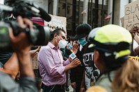Protester being interviewed by a news channel during the Black Lives Matter protest at Hollywood & Vine. 2 JUN, 2020, LOS ANGELES, USA