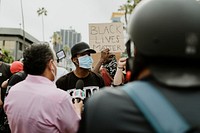 Protester being interviewed by a news channel during the Black Lives Matter protests in downtown Los Angeles. 8 JUL, 2020, LOS ANGELES, USA
