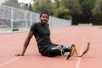 Top mockup on paralympic athlete relaxing by the running track psd