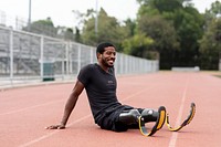 Top mockup on paralympic athlete relaxing by the running track psd